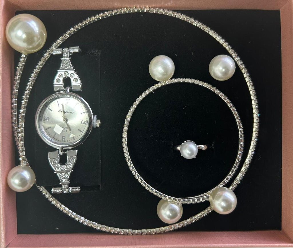 Conjunto de joyas plateado con perlas aleatorio.