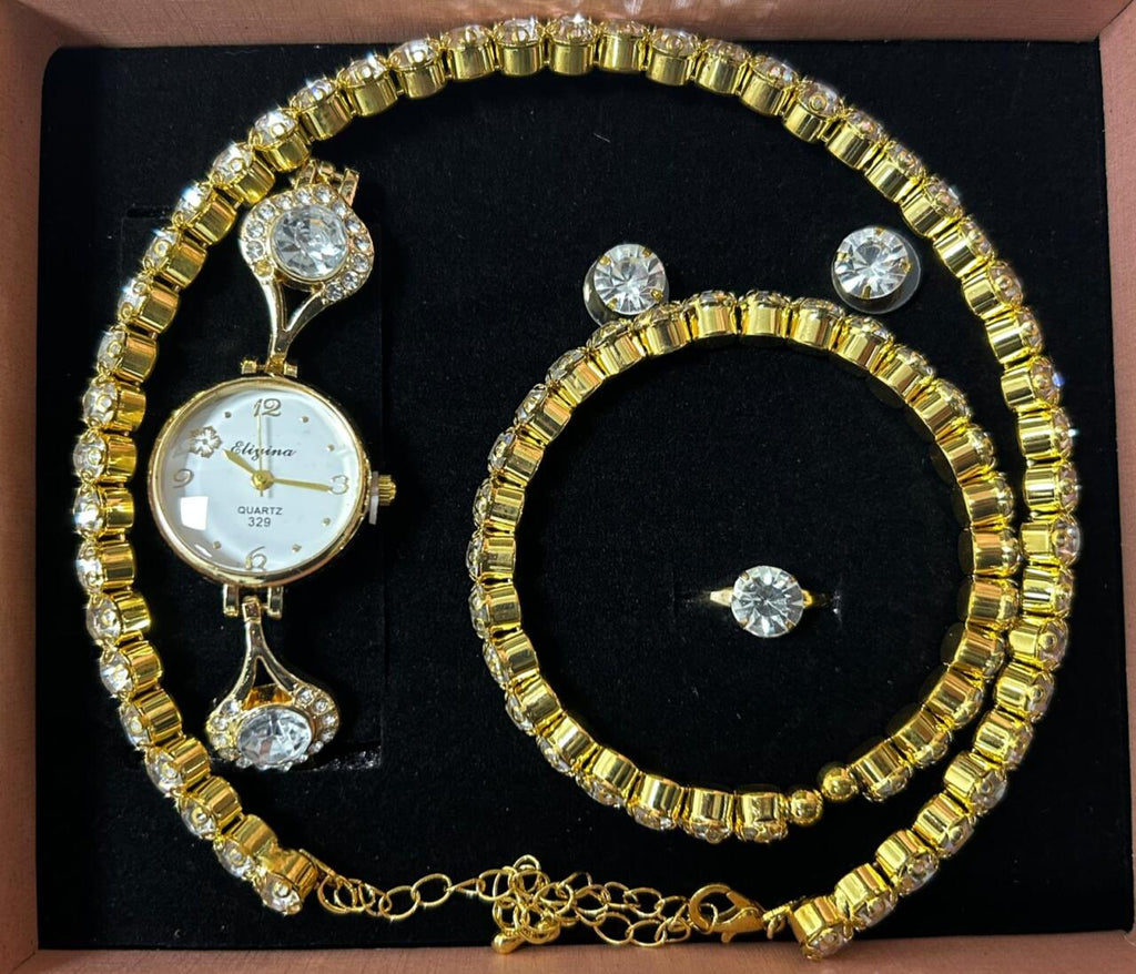 Conjunto de joyas dorado aleatorio.