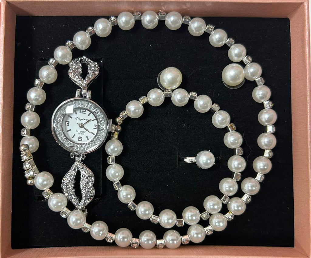 Conjunto de joyas plateado con perlas aleatorio.